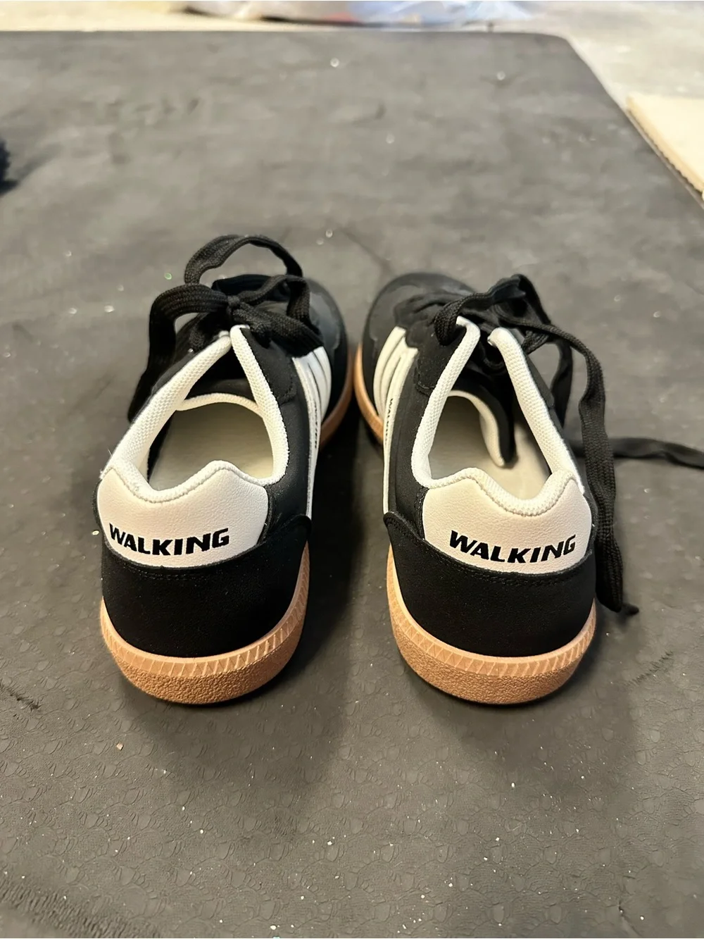Women’s Black and White casual walking shoes with brown rubber sole
